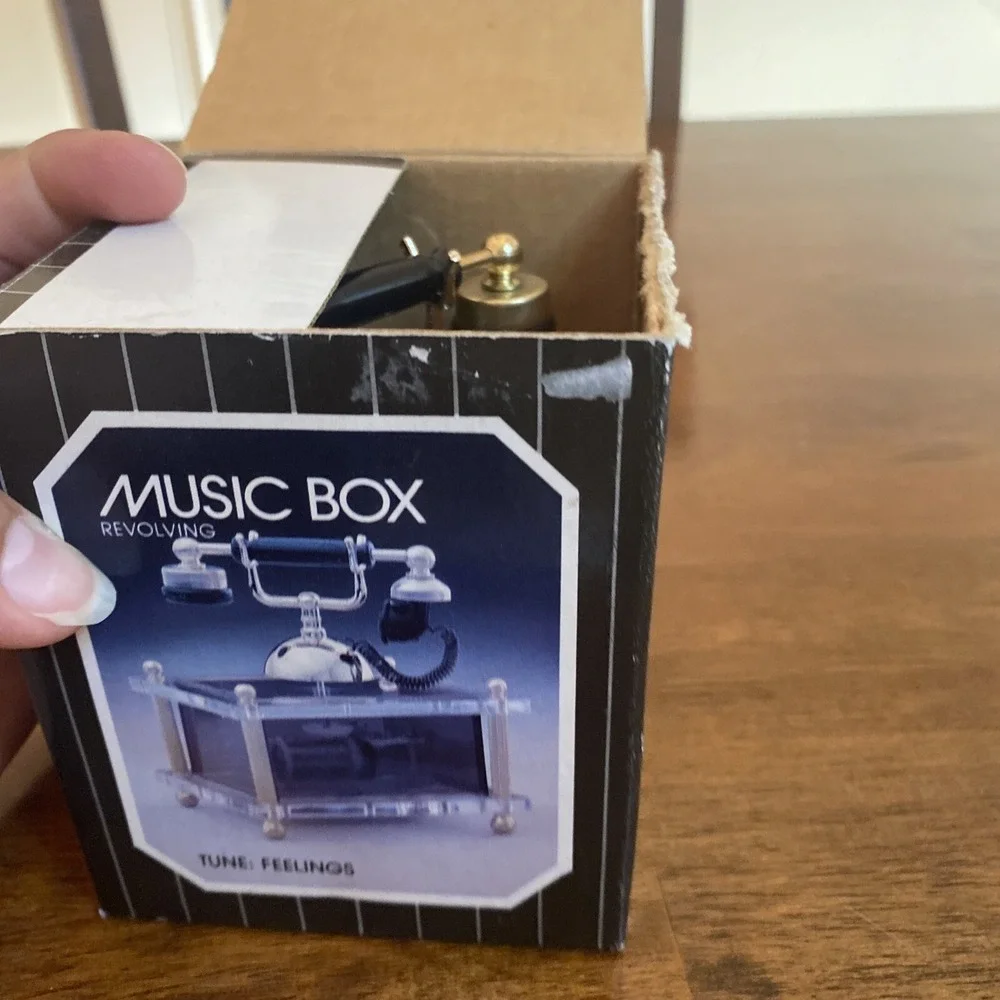 Musical Revolving Telephone With Gold Accents Song (Fillings)
